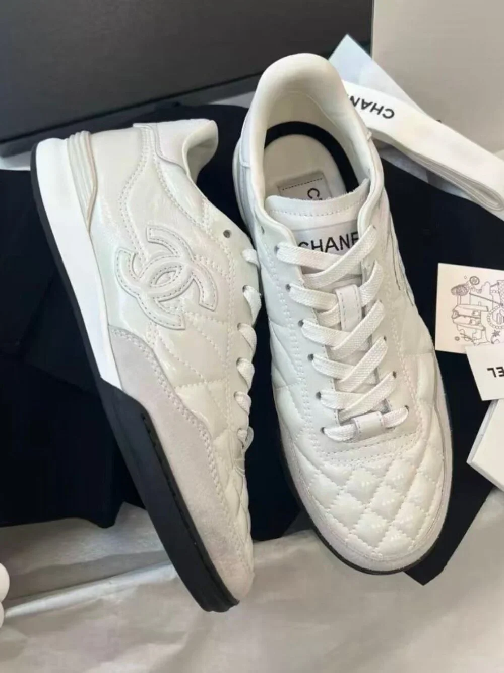 Chanel White Quilted CC Logo Leather & Suede Low‑Top Sneakers